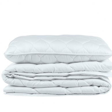 Quilted pillow with microfiber balls